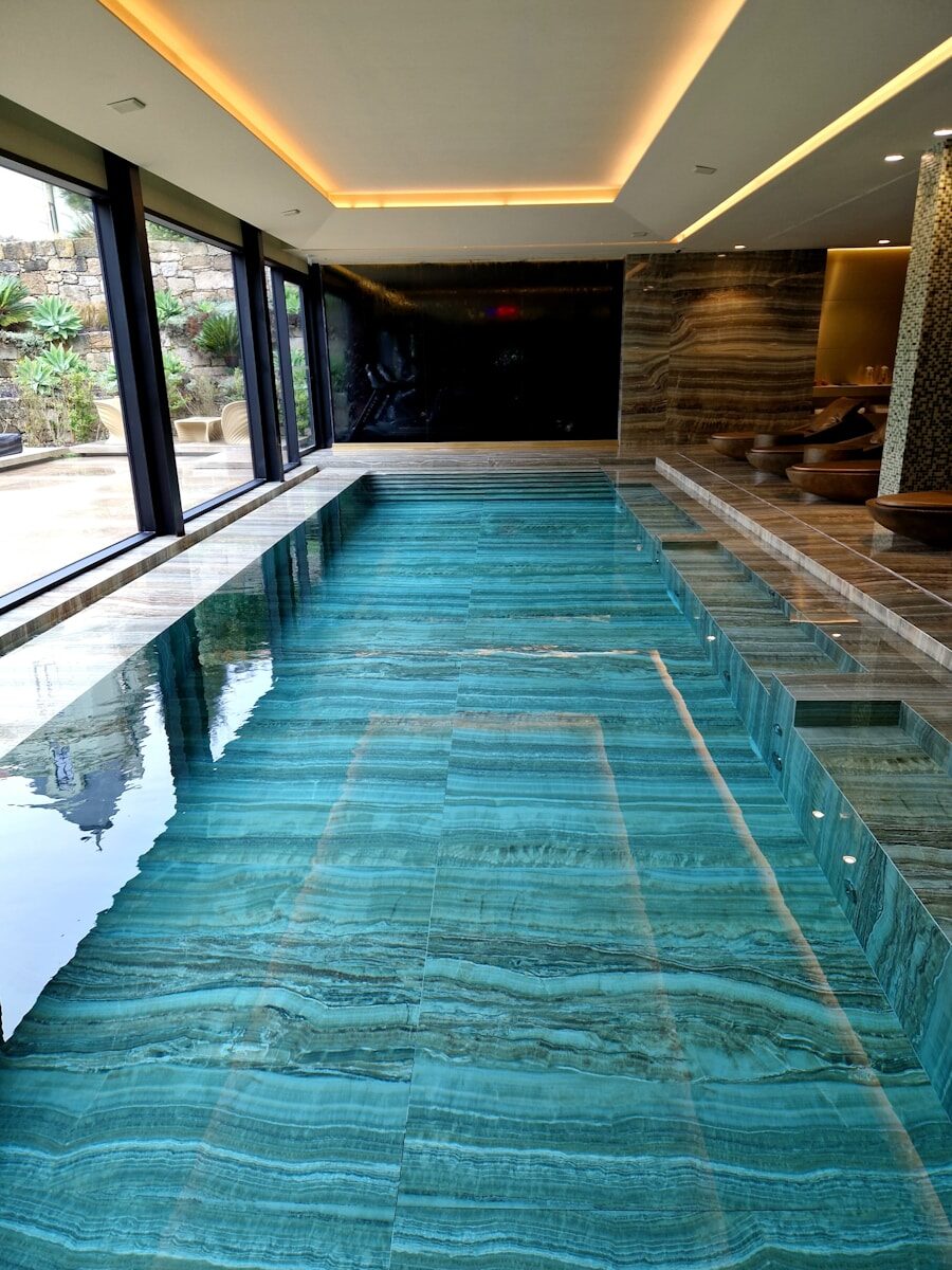 A large indoor swimming pool in a house