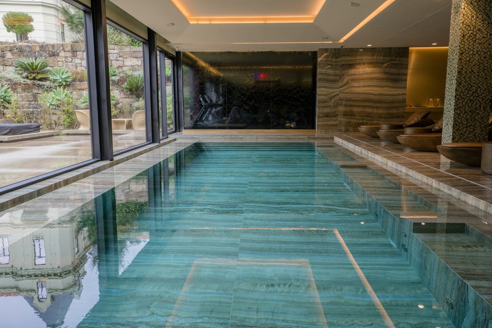 A large indoor swimming pool in a house